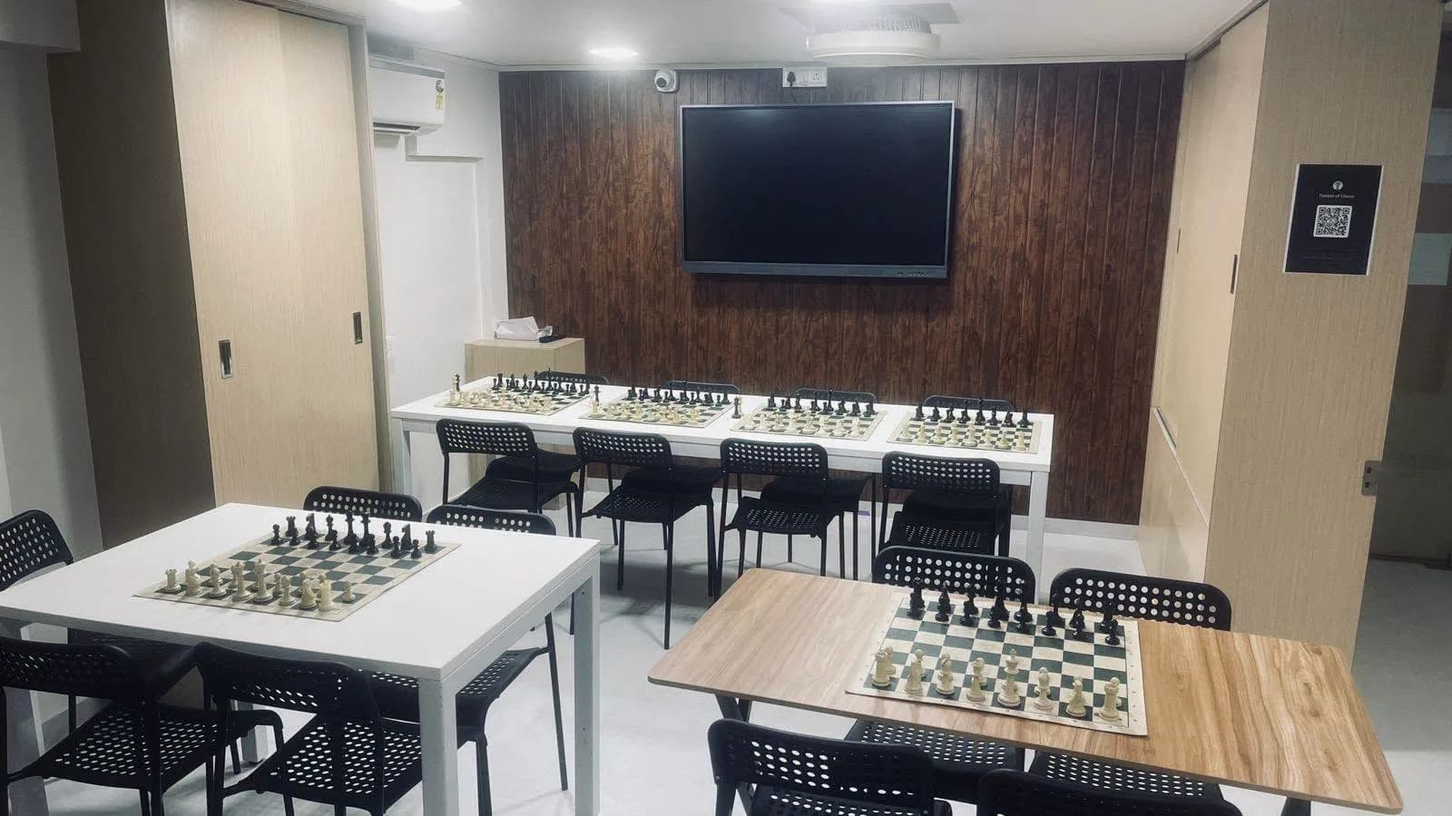 The new Temple of Chess room, with boards set up on every table